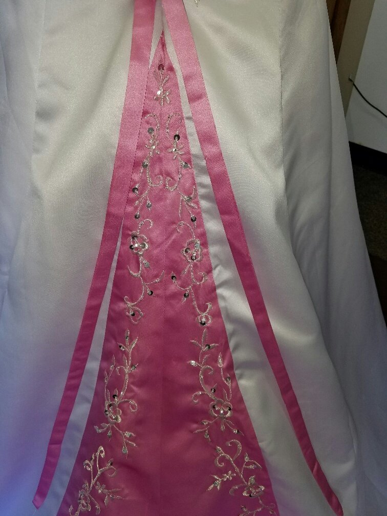 white and pink wedding gown